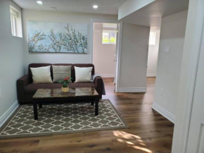 Sun filled Apartment suite, steps from GO transit